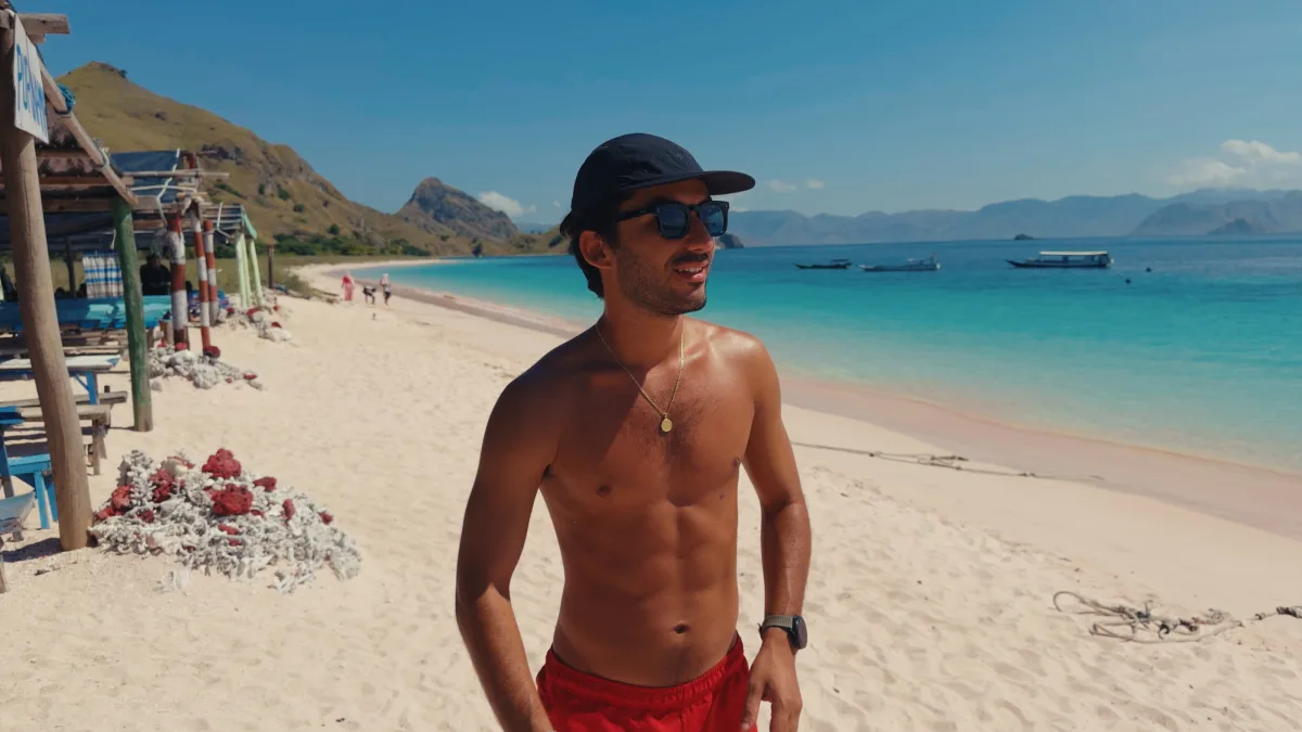 The same beach, graded by Cupidon: deep blue sky, turquoise sea, warm skin.
